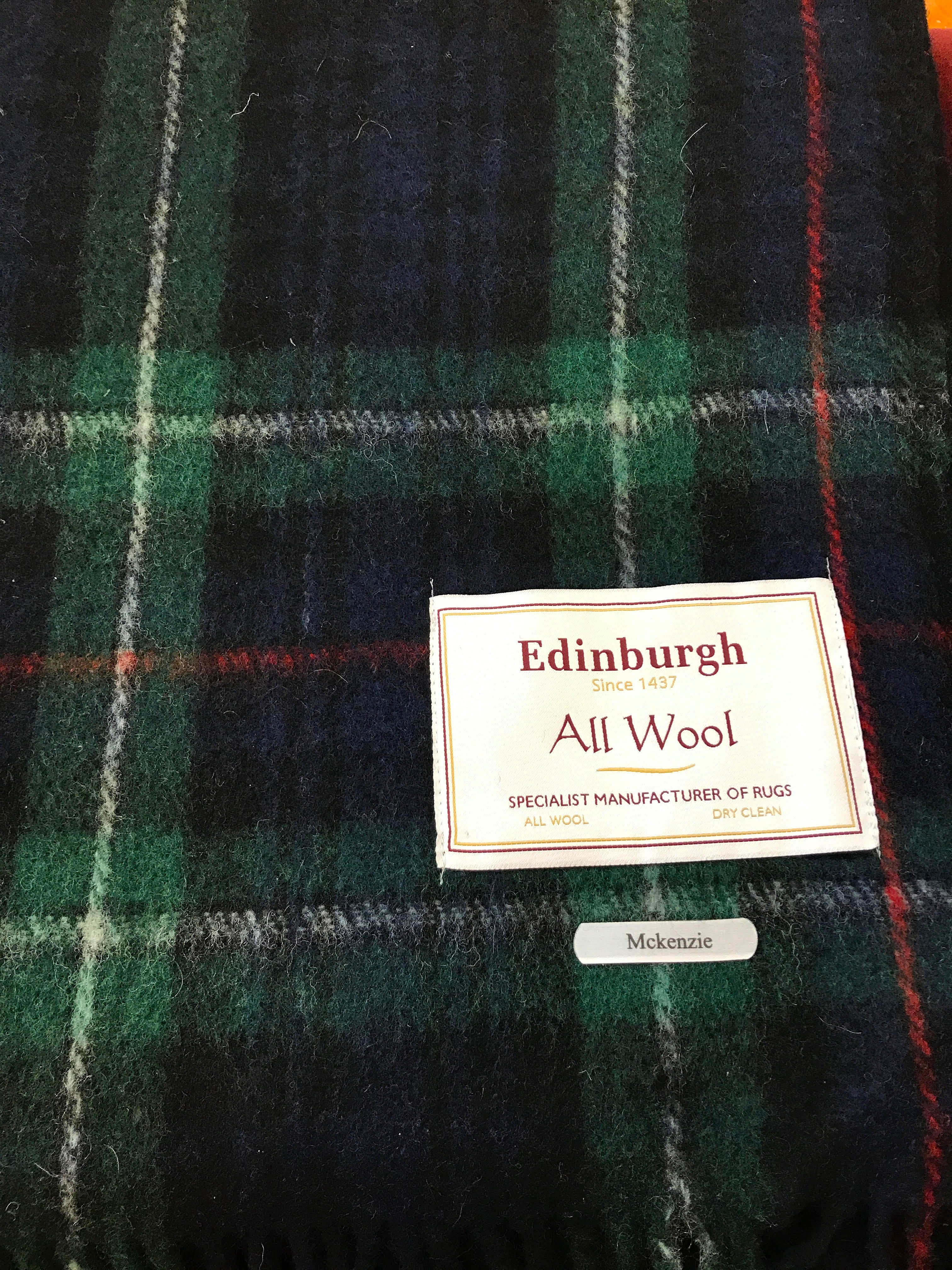 Tartan Wool Blanket in Mckenzie. Woven in the UK. Buy online at Red Scarf Equestrian Canada.