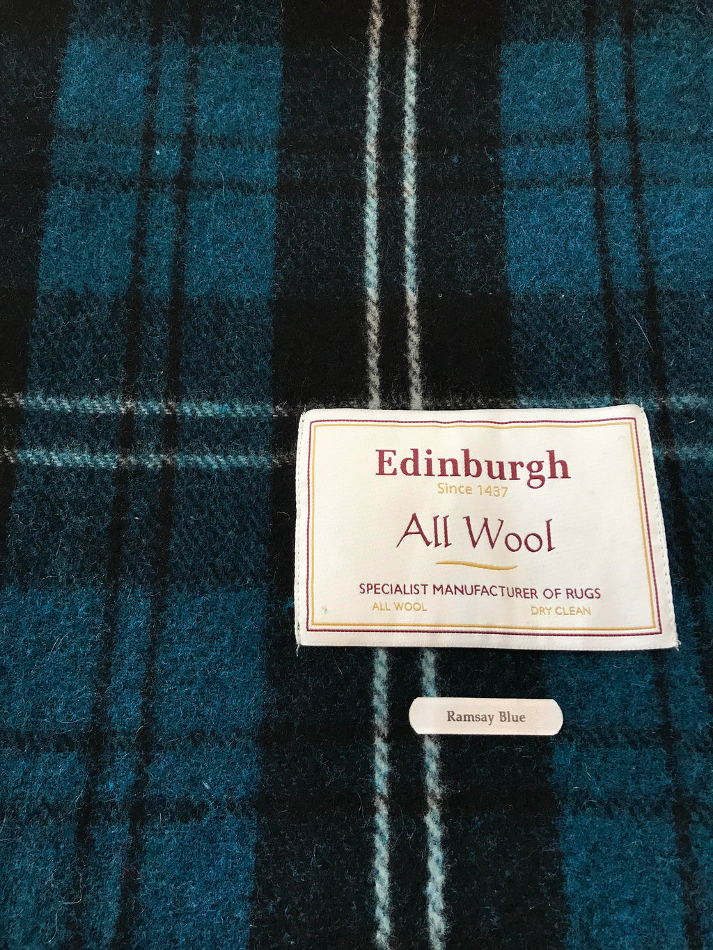 Tartan Wool Blanket in Ramsay Blue. Woven in the UK. Buy online at Red Scarf Equestrian Canada.