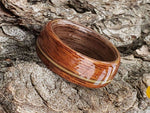Load image into Gallery viewer, Sapele on Walnut with a Brass Guitar String Inlay
